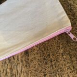 Canvas cosmetic bag with Pink zip